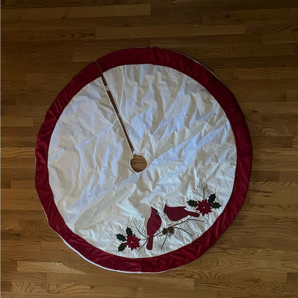Red Cardinal Christmas tree skirt with red poinsettias.